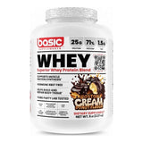 Proteína Basic Whey Basic Supplements sabor Boston Cream Donut — 25 g de proteína por porción — vista frontal del envase