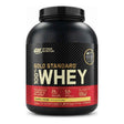 Proteína Gold Standard 100% Whey Optimum Nutrition sabor Banana Cream — proteína de suero con aislado como ingrediente principal, 24 g de proteína por porción — vista frontal del envase