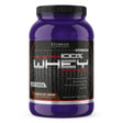 Proteína Prostar 100% Whey Ultimate Nutrition sabor Chocolate — envase de 2 lb (907 g) — 25 g de proteína por porción — vista frontal