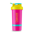 Shaker OstroVit Miami Vibes de 400 ml en color rosado, con el compartimento inferior visible y el logo de OstroVit
